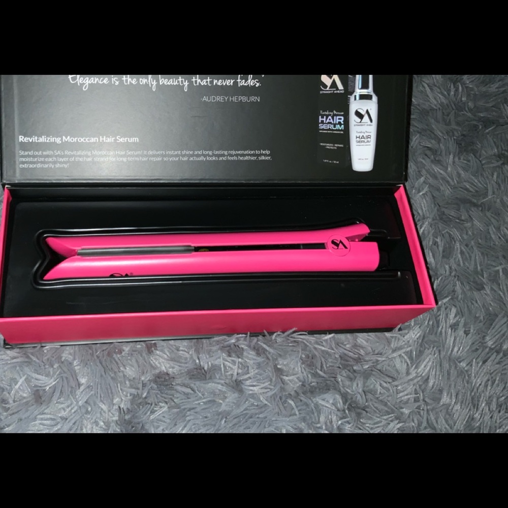 New, unused Straight Ahead flat iron.